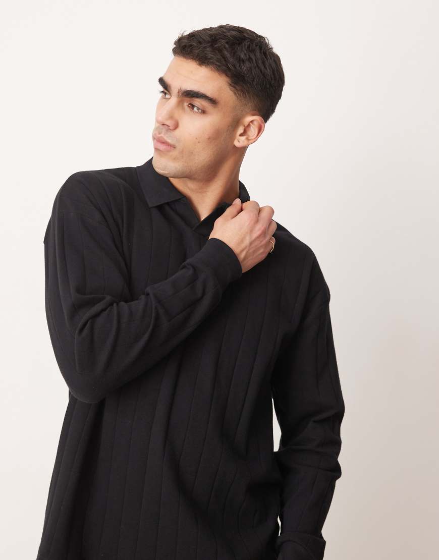 ASOS DESIGN - Langärmliges Oversize-Poloshirt in Schwarz mit Reverskragen und Rippenstruktur von ASOS DESIGN