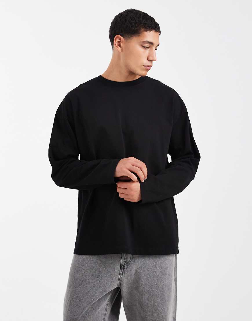 ASOS DESIGN - Langärmliges Oversize-Shirt aus schwerem Material in Schwarz von ASOS DESIGN