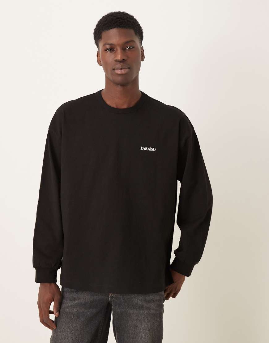 ASOS DESIGN - Langärmliges Oversize-T-Shirt in Schwarz mit Stickerei auf der Brust von ASOS DESIGN