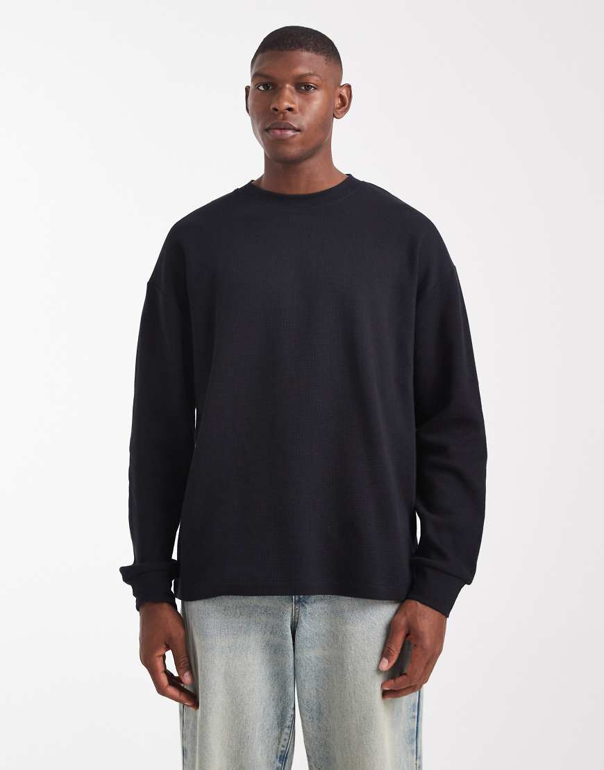 ASOS DESIGN - Langärmliges Oversize-T-Shirt in Schwarz mit Waffelstruktur von ASOS DESIGN