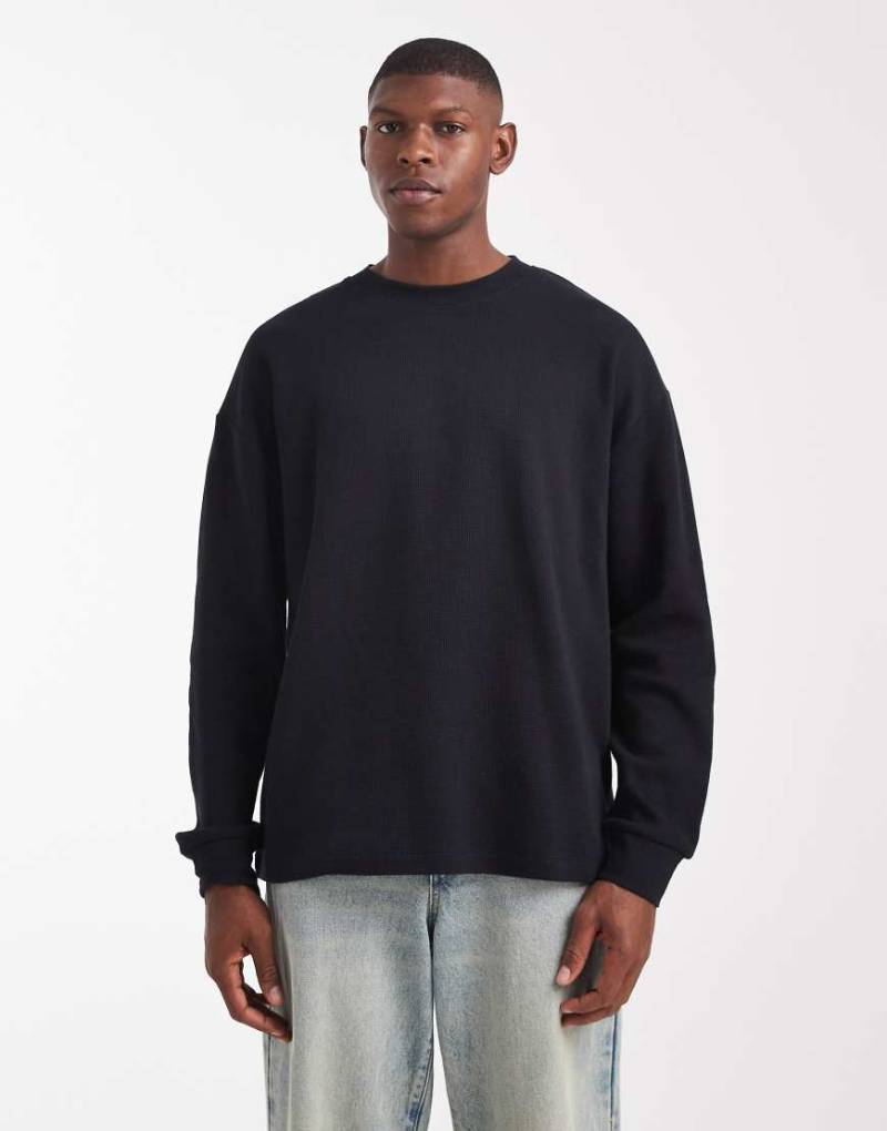 ASOS DESIGN - Langärmliges Oversize-T-Shirt in Schwarz mit Waffelstruktur von ASOS DESIGN