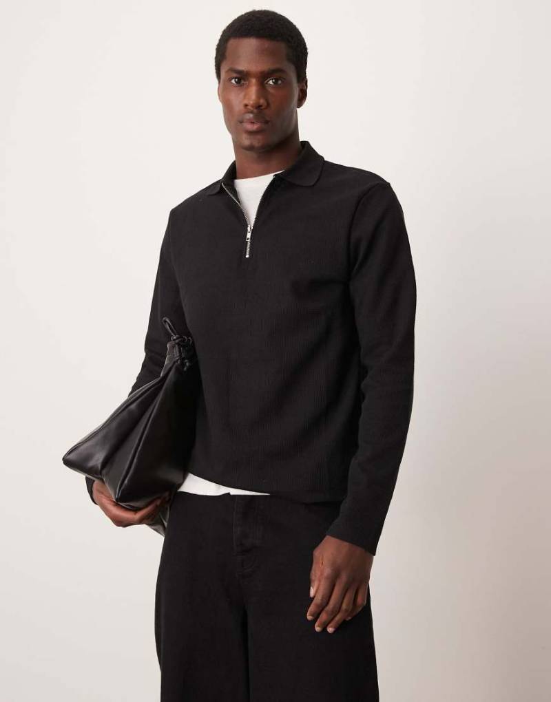 ASOS DESIGN - Langärmliges Poloshirt in Schwarz mit Waffelstruktur von ASOS DESIGN