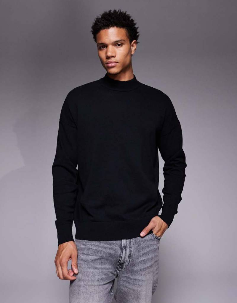 ASOS DESIGN - Langärmliges Relaxed-Fit-T-Shirt mit Rollkragen in Schwarz von ASOS DESIGN