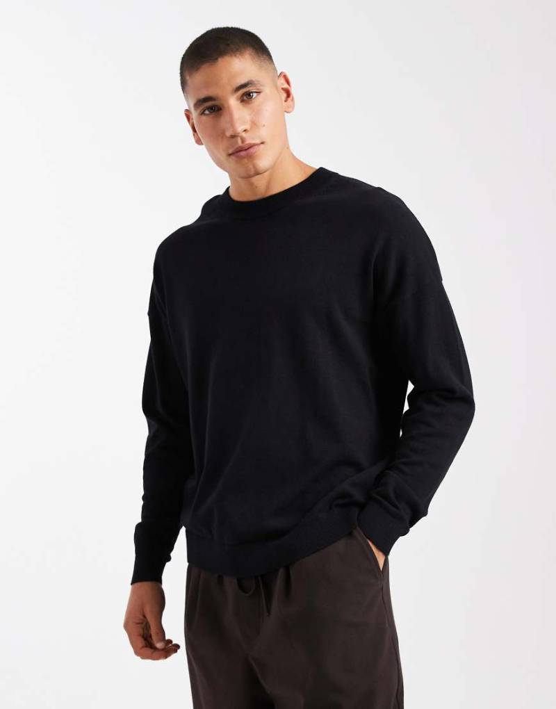 ASOS DESIGN - Langärmliges Relaxed-Fit-T-Shirt mit Rundhalsausschnitt in Schwarz von ASOS DESIGN