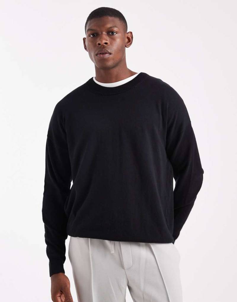 ASOS DESIGN - Langärmliges Relaxed-Fit-T-Shirt mit Rundhalsausschnitt in Schwarz von ASOS DESIGN