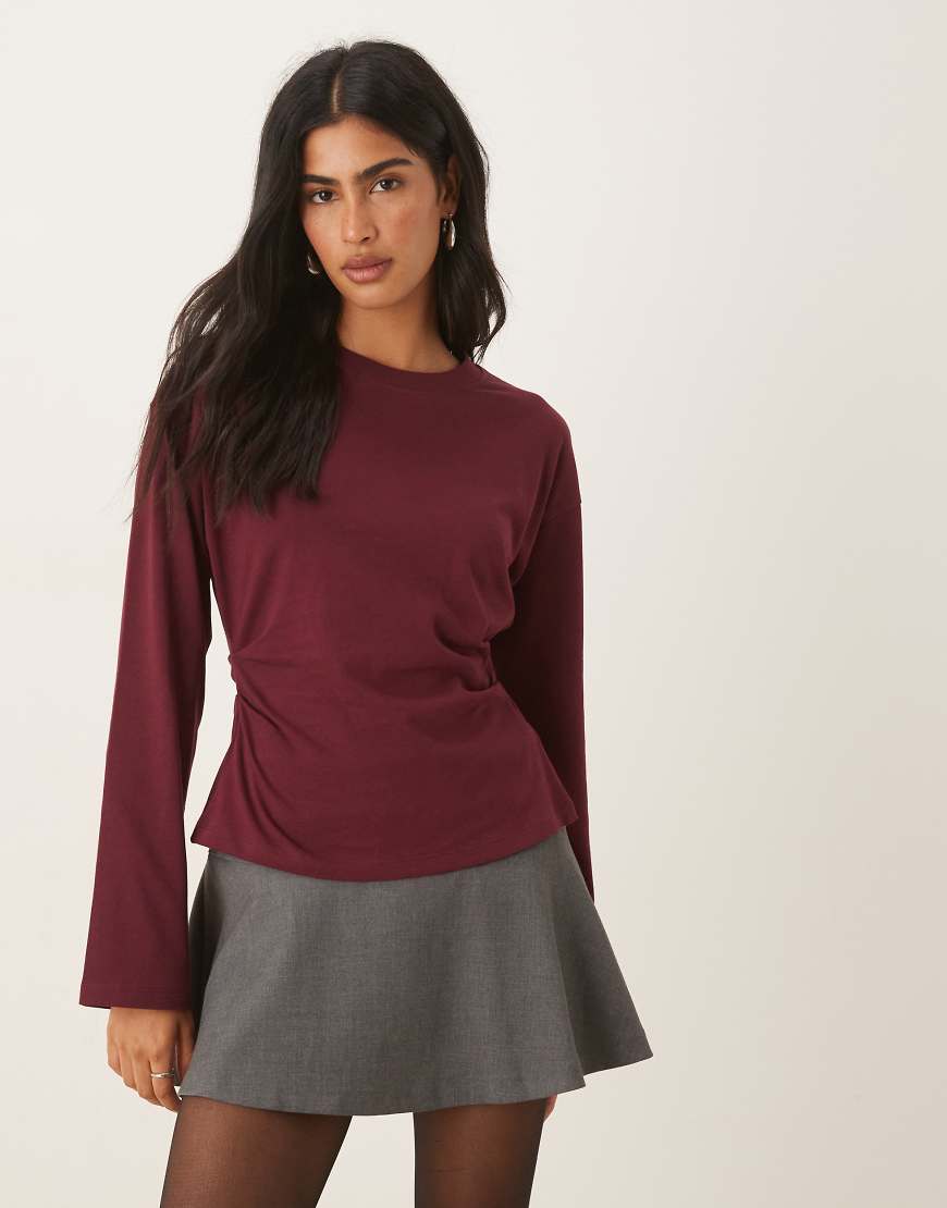 ASOS DESIGN - Langärmliges Shirt in Burgunderrot mit Korsett-Taille von ASOS DESIGN
