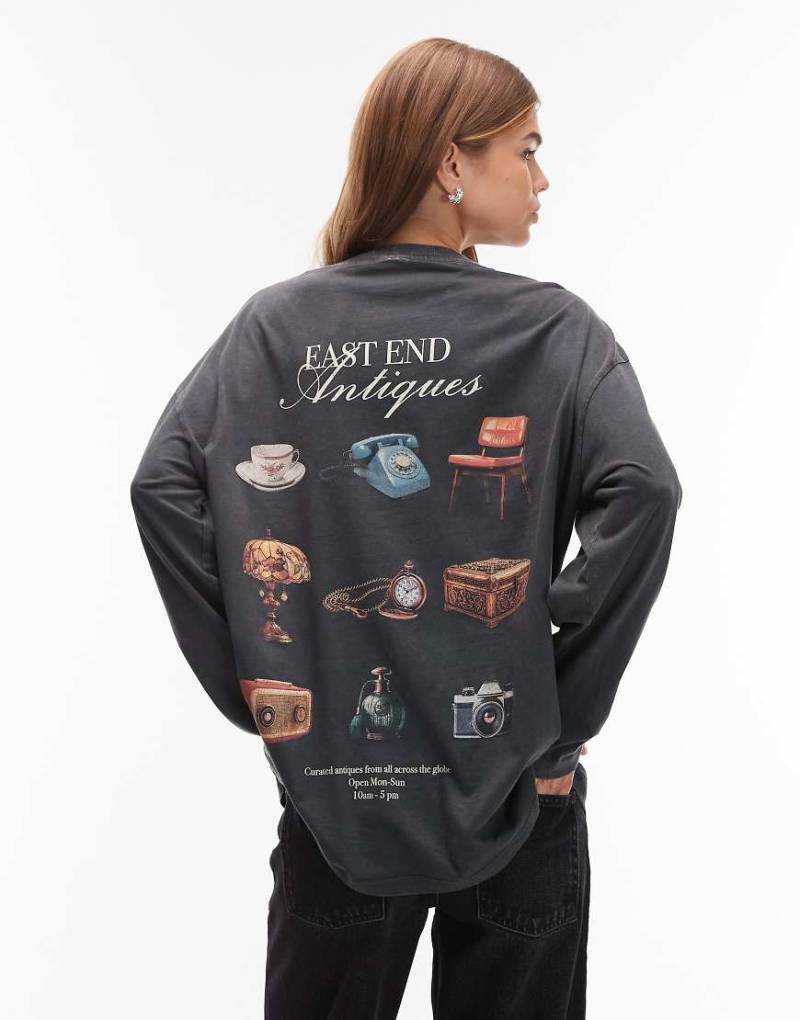 ASOS DESIGN - Langärmliges Skater-T-Shirt in verwaschenem Anthrazit mit „Antiques"-Print-Schwarz von ASOS DESIGN