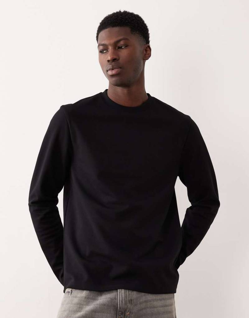 ASOS DESIGN - Langärmliges T-Shirt in Schwarz aus schwerem breatheMAX-Baumwollmix von ASOS DESIGN