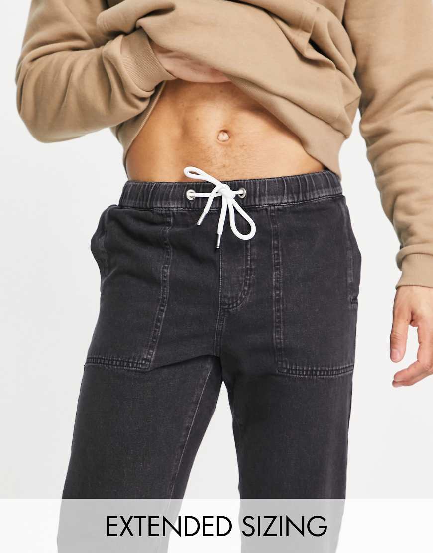 ASOS DESIGN - Legere, leichte Jeans-Jogginghose in verwaschenem Schwarz von ASOS DESIGN
