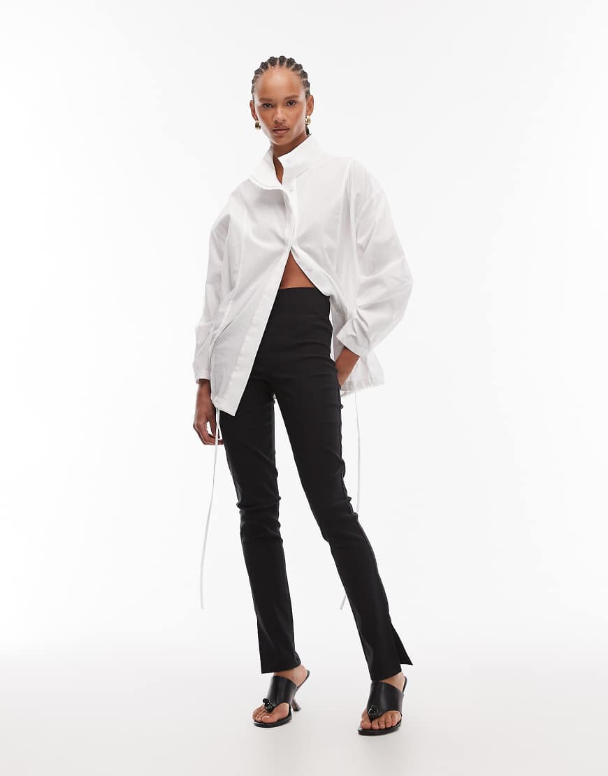 ASOS DESIGN - Leicht verlängerte Bengaline-Leggings in Schwarz mit Seitenschlitz von ASOS DESIGN