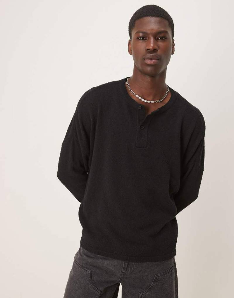ASOS DESIGN - Leichter, kastiger Bouclé-Strickpullover in Schwarz mit extremer Oversize-Passform von ASOS DESIGN