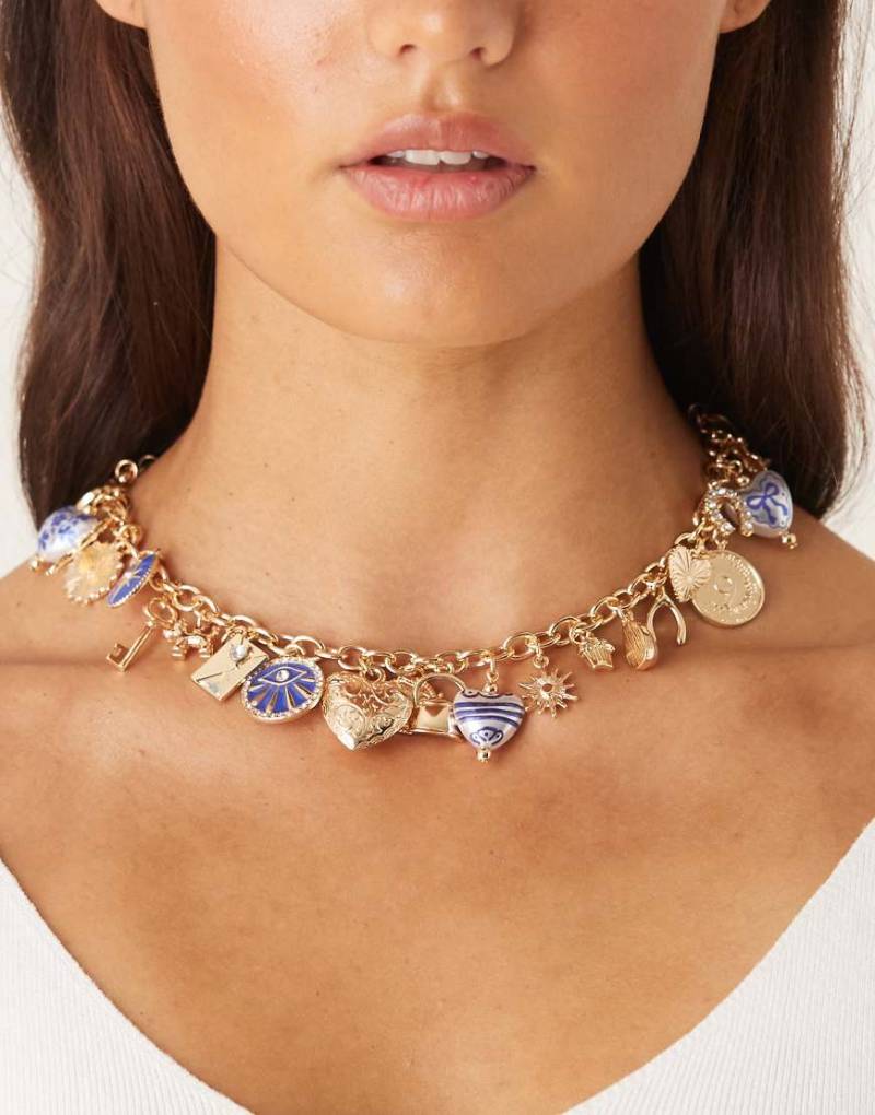ASOS DESIGN - Limited Edition - Goldfarbene, kurze Halskette mit Anhängern in unterschiedlichen Größen von ASOS DESIGN