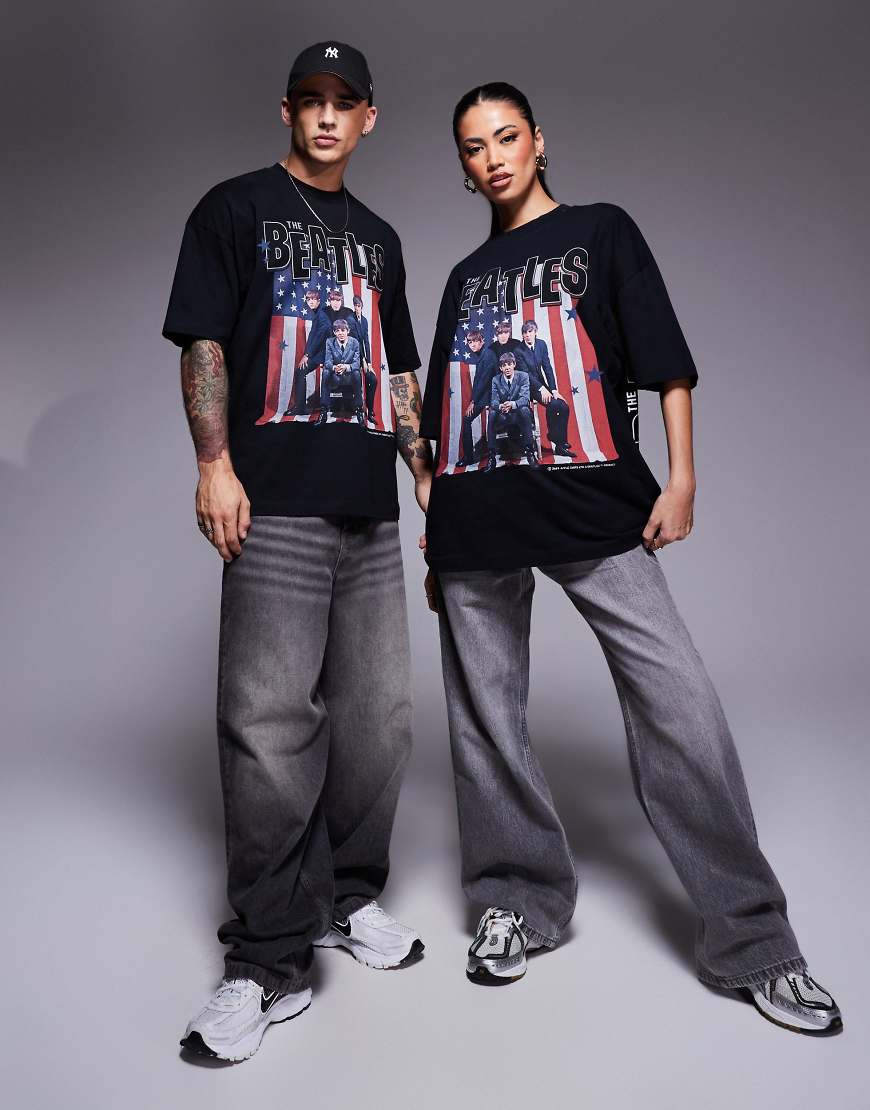 ASOS DESIGN - Lizenziertes Unisex-T-Shirt in Schwarz mit Oversize-Schnitt und „The Beatles USA Tour"-Prints von ASOS DESIGN