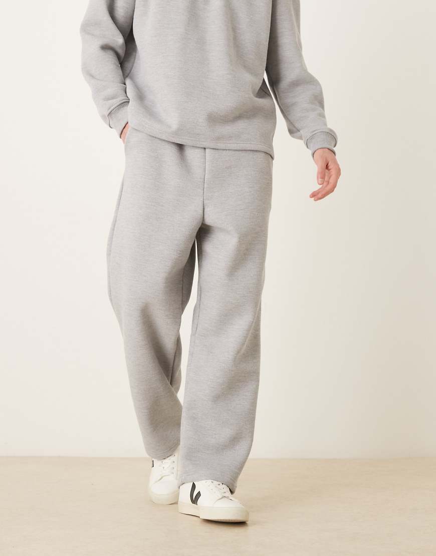 ASOS DESIGN - Schmal zulaufende, locker geschnittene Jogginghose aus angerautem Pikee in Grau meliert von ASOS DESIGN