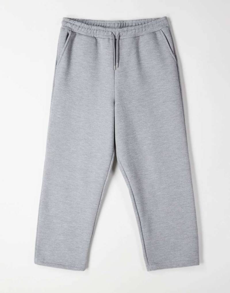 ASOS DESIGN - Locker geschnittene, schmal zulaufende Pikee-Jogginghose in meliertem Grau von ASOS DESIGN
