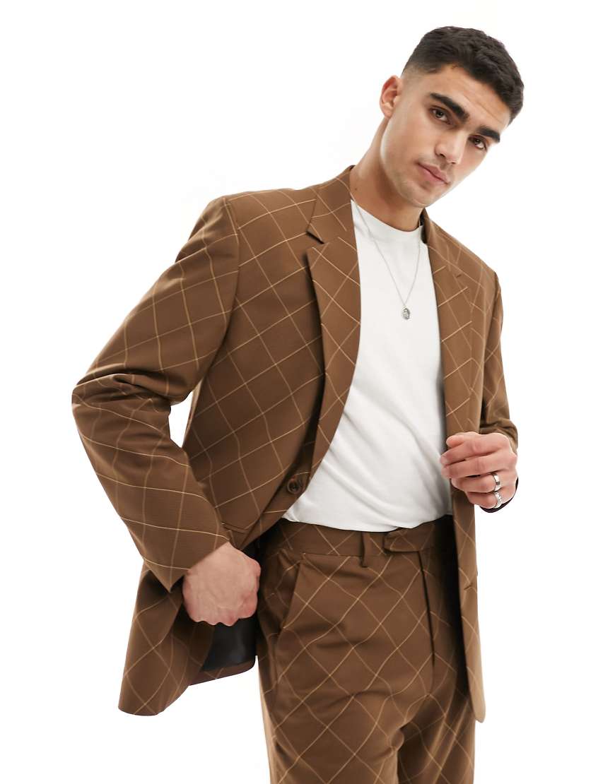 ASOS DESIGN - Locker geschnittene Anzugjacke in kariertem Braun ASOS DESIGN - Locker geschnittene Anzugjacke in kariertem Braun von ASOS DESIGN