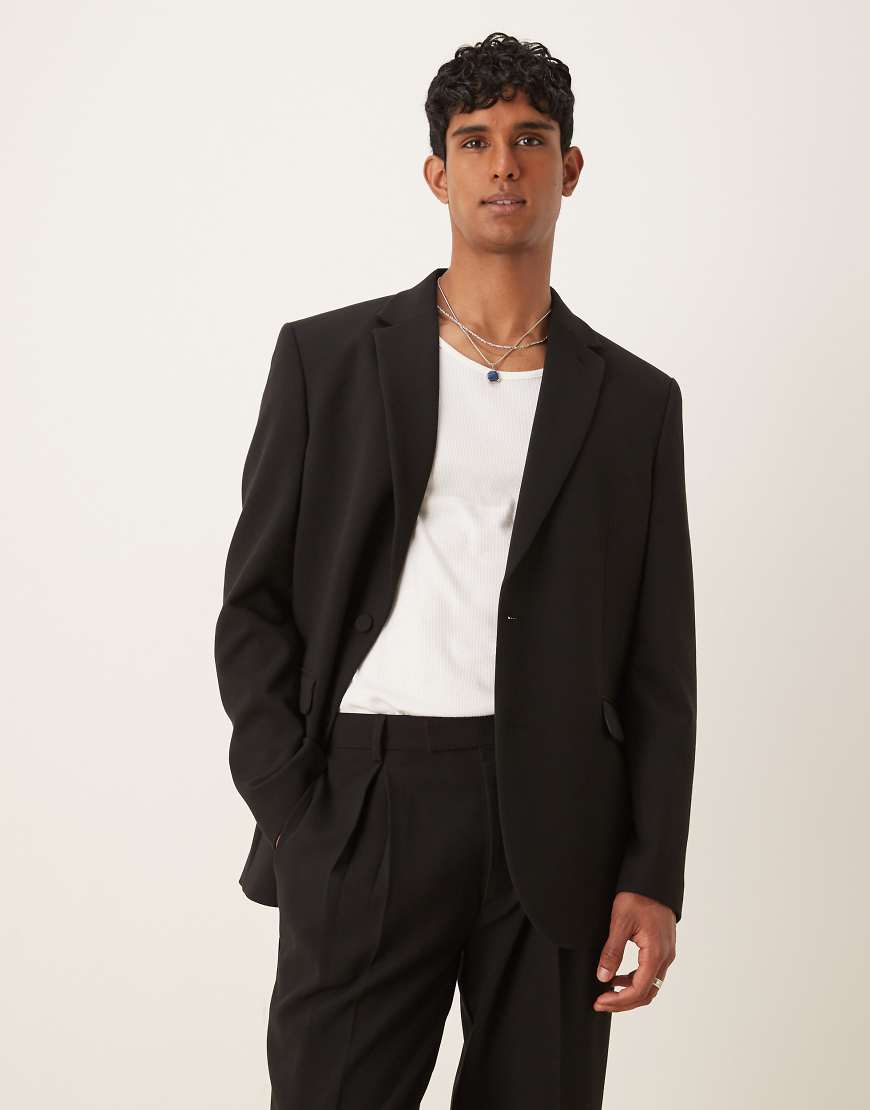 ASOS DESIGN - Locker geschnittene Longline-Anzugjacke in Schwarz ASOS DESIGN - Locker geschnittene Longline-Anzugjacke in Schwarz von ASOS DESIGN