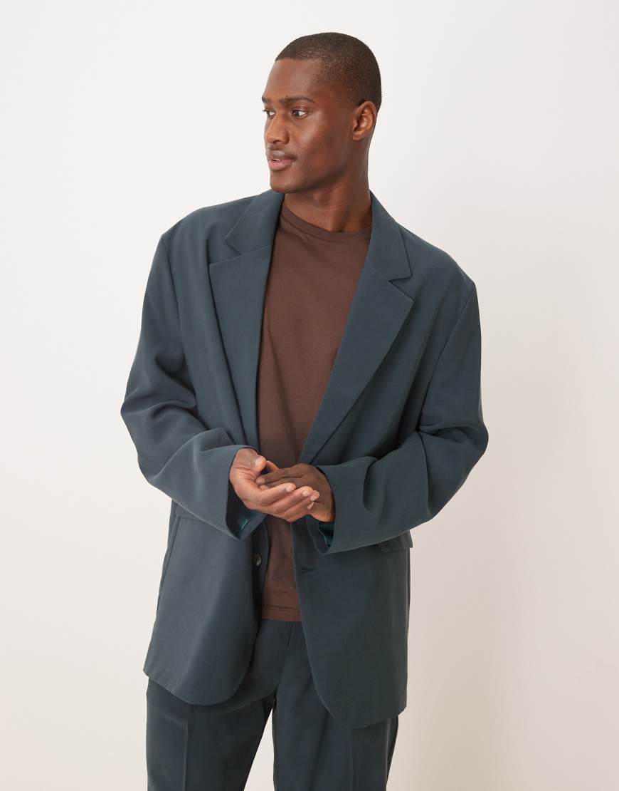 ASOS DESIGN - Locker geschnittene Oversize-Anzugjacke in Blau-Schwarz ASOS DESIGN - Locker geschnittene Oversize-Anzugjacke in Blau-Schwarz von ASOS DESIGN