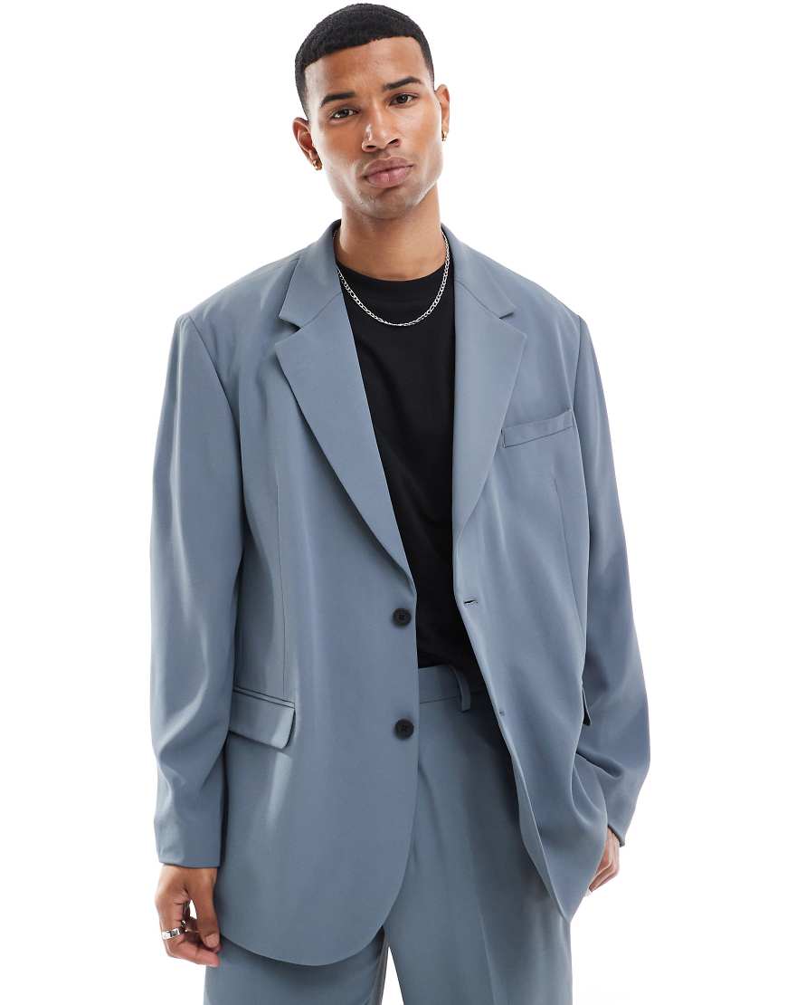 ASOS DESIGN - Locker geschnittene Oversize-Anzugjacke in Blau ASOS DESIGN - Locker geschnittene Oversize-Anzugjacke in Blau von ASOS DESIGN