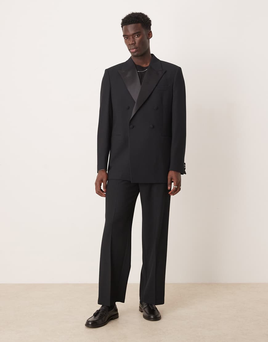 ASOS DESIGN - Locker geschnittene Smoking-Anzugjacke in Schwarz mit Struktur ASOS DESIGN - Locker geschnittene Smoking-Anzugjacke in Schwarz mit Struktur von ASOS DESIGN