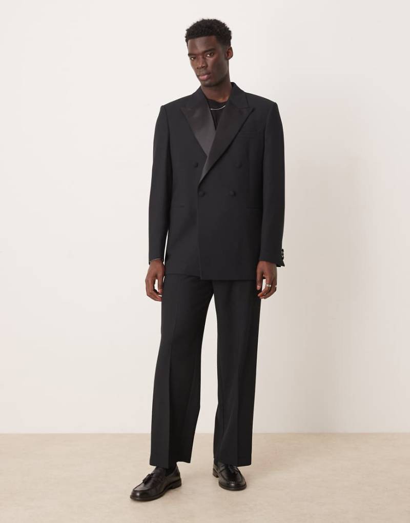 ASOS DESIGN - Locker geschnittene Smoking-Anzugjacke in Schwarz mit Struktur von ASOS DESIGN