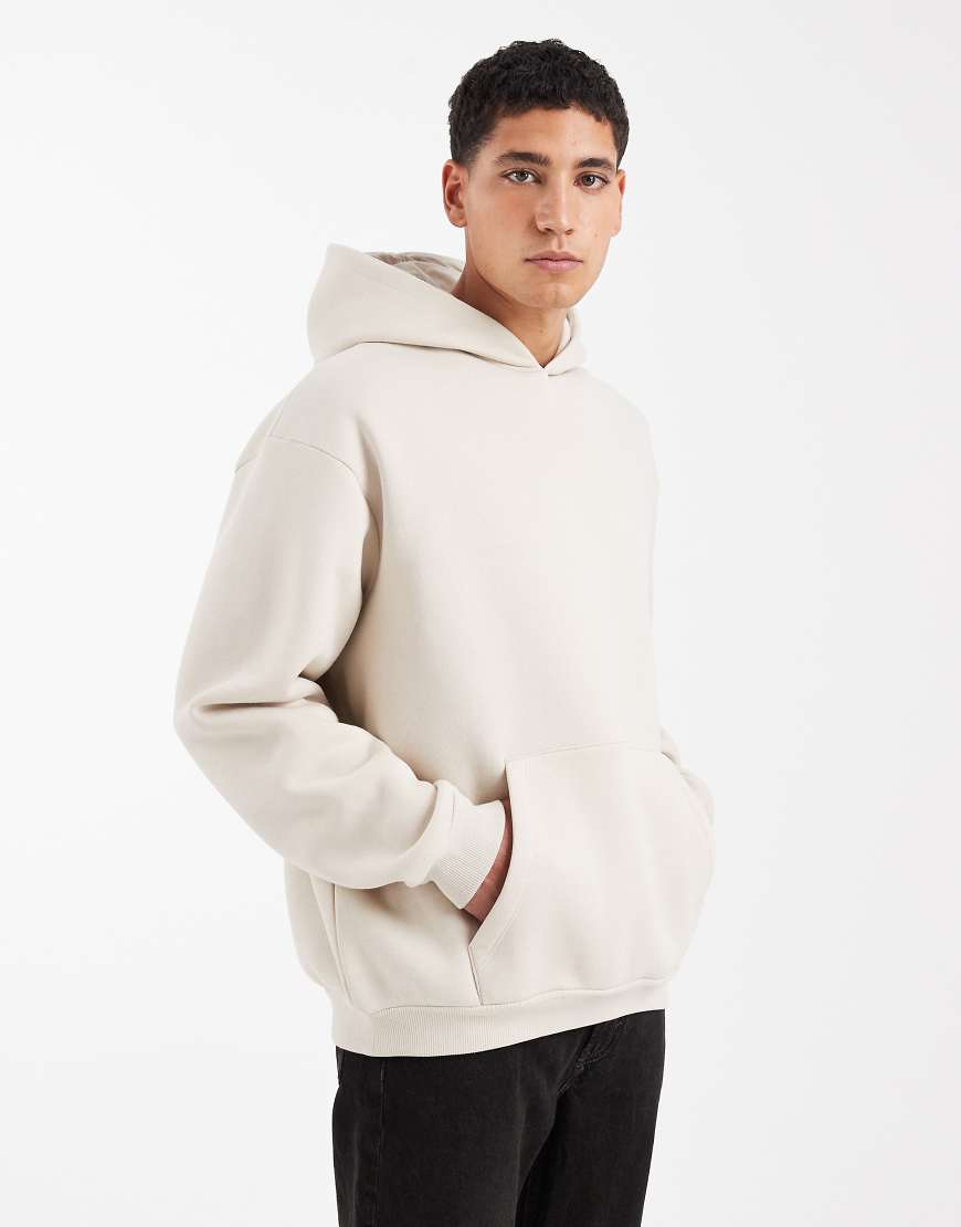 ASOS DESIGN - Locker geschnittener Basic-Kapuzenpullover in Ecru-Neutral von ASOS DESIGN