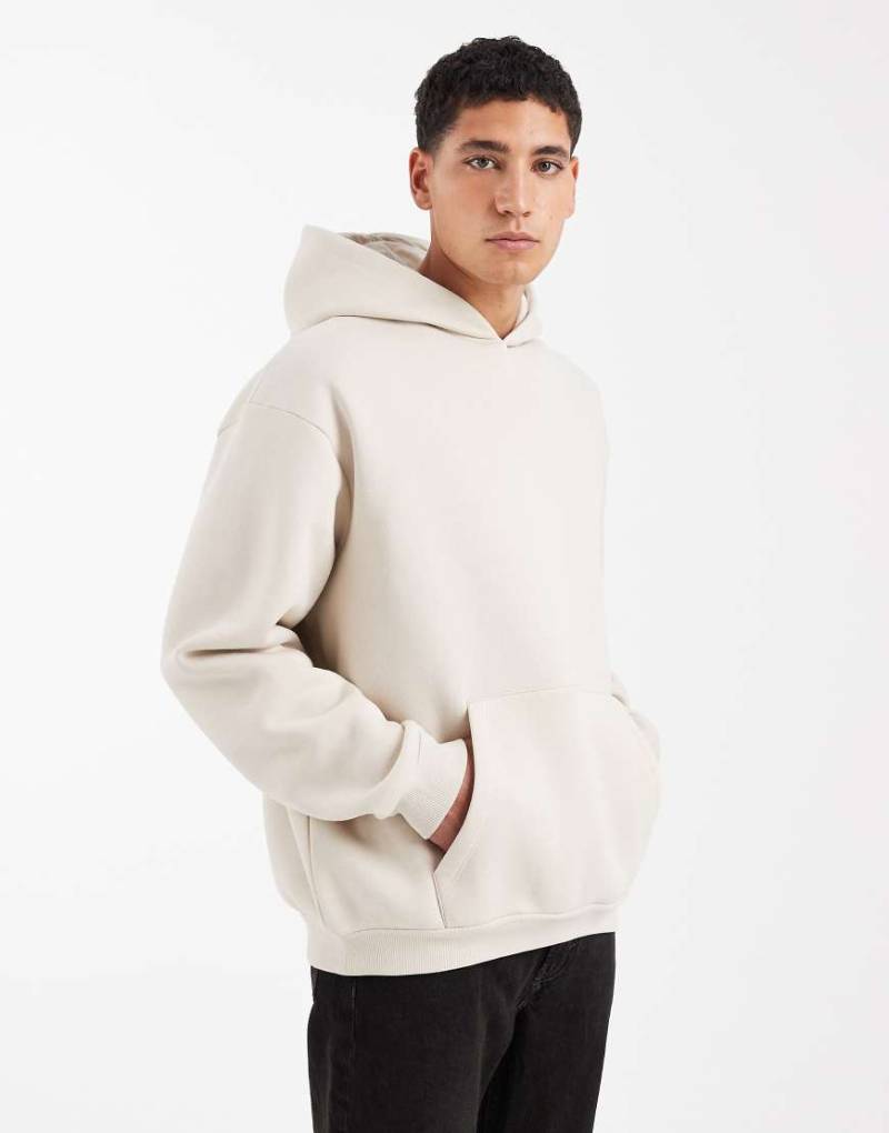 ASOS DESIGN - Locker geschnittener Basic-Kapuzenpullover in Ecru-Neutral von ASOS DESIGN