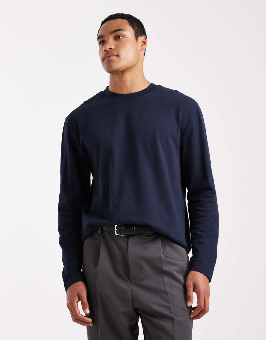 ASOS DESIGN - Locker geschnittenes, langärmliges T-Shirt aus schwerem Stoff in Marineblau ASOS DESIGN - Locker geschnittenes, langärmliges T-Shirt aus schwerem Stoff in Marineblau von ASOS DESIGN