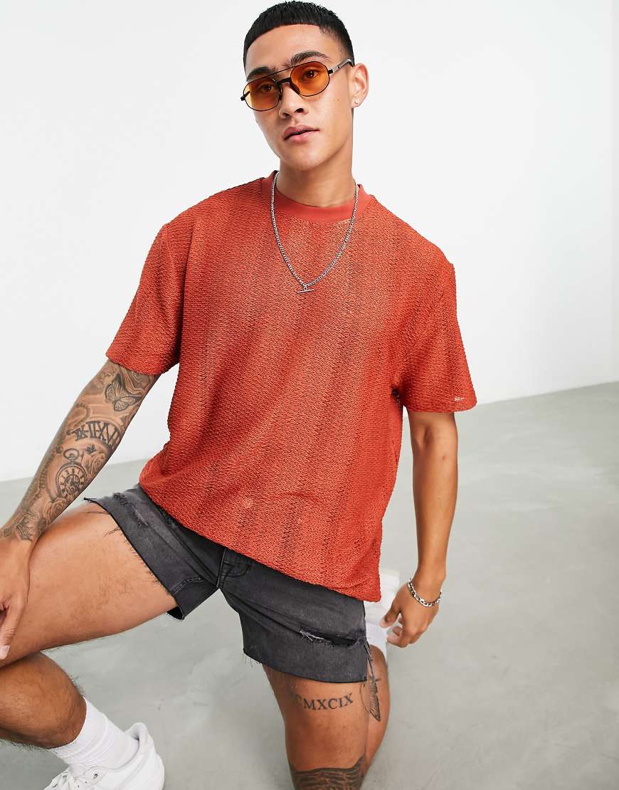 ASOS DESIGN - Locker geschnittenes, strukturiertes T-Shirt in Dunkelorange von ASOS DESIGN