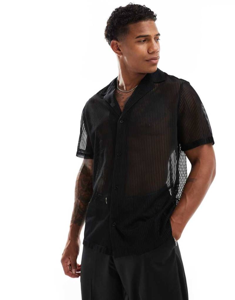 ASOS DESIGN - Locker geschnittenes Hemd in Schwarz aus Spitze mit tiefem Reverskragen von ASOS DESIGN