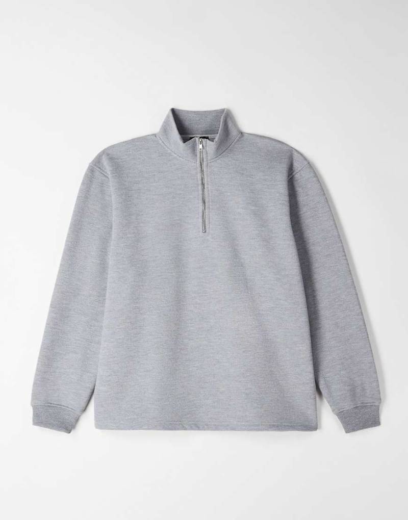ASOS DESIGN - Locker geschnittenes Pikee-Sweatshirt in meliertem Grau mit kurzem Reißverschluss von ASOS DESIGN