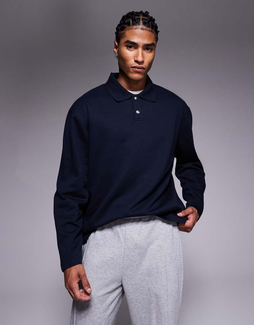 ASOS DESIGN - Locker geschnittenes Polo-Sweatshirt in Marineblau mit Knopfleiste und geripptem Kragen von ASOS DESIGN