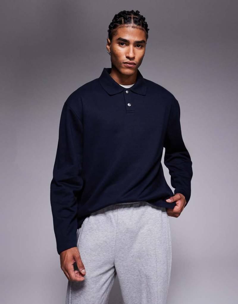 ASOS DESIGN - Locker geschnittenes Polo-Sweatshirt in Marineblau mit Knopfleiste und geripptem Kragen von ASOS DESIGN