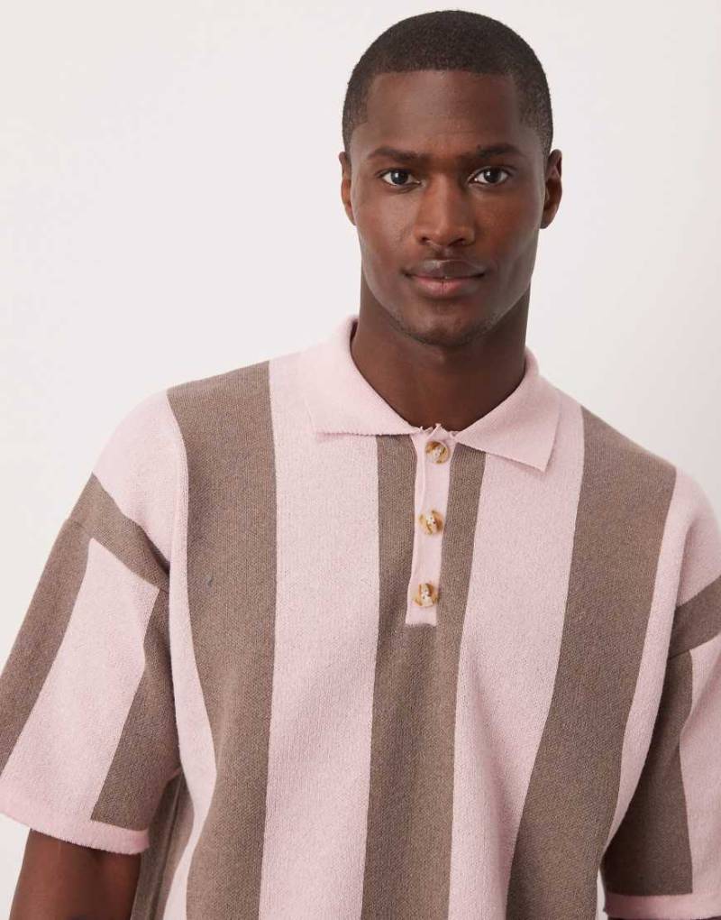 ASOS DESIGN - Locker geschnittenes Strick-Polohemd in Rosa mit Streifen von ASOS DESIGN