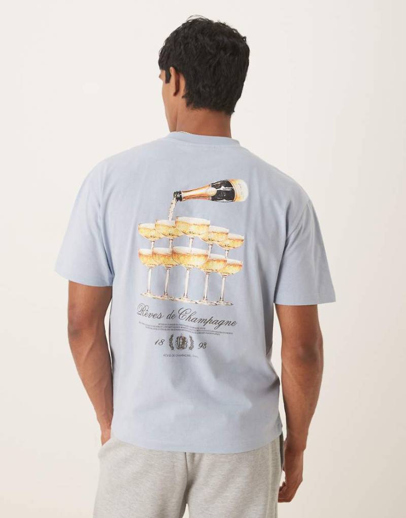 ASOS DESIGN - Locker geschnittenes T-Shirt in Hellblau mit Drinks-Grafikmotiv von ASOS DESIGN