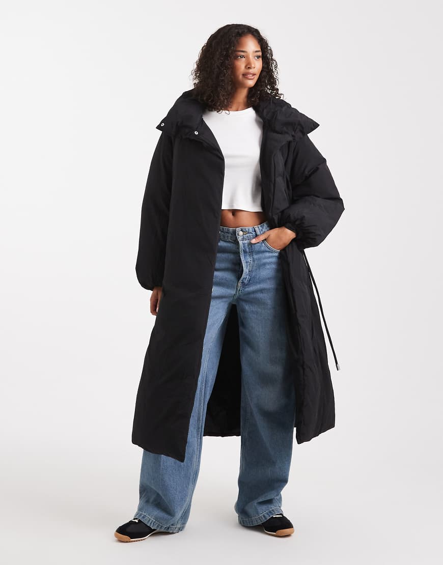 ASOS DESIGN - Longline-Pufferjacke in Schwarz mit Trichterkragen-Grau ASOS DESIGN - Longline-Pufferjacke in Schwarz mit Trichterkragen-Grau von ASOS DESIGN