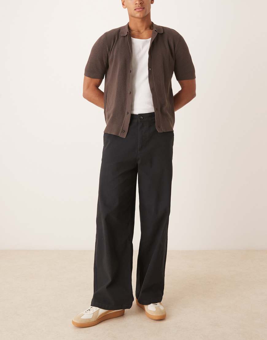 ASOS DESIGN - Loose Fit Chinohose in Schwarz ASOS DESIGN - Loose Fit Chinohose in Schwarz von ASOS DESIGN