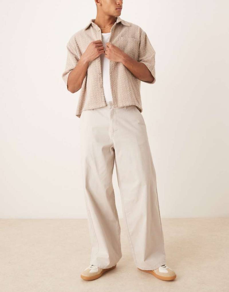 ASOS DESIGN - Loose Fit Chinohose in Steinbeige-Neutral von ASOS DESIGN