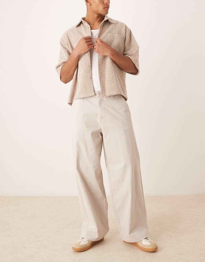 ASOS DESIGN - Loose Fit Chinohose in Steinbeige-Neutral von ASOS DESIGN