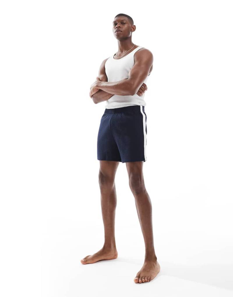 ASOS DESIGN - Lounge-Shorts in Marineblau mit Waffelstruktur und Einfassung von ASOS DESIGN