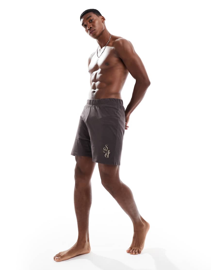 ASOS DESIGN - Lounge-Shorts in Sealbraun mit kontrastierender Stickerei ASOS DESIGN - Lounge-Shorts in Sealbraun mit kontrastierender Stickerei von ASOS DESIGN