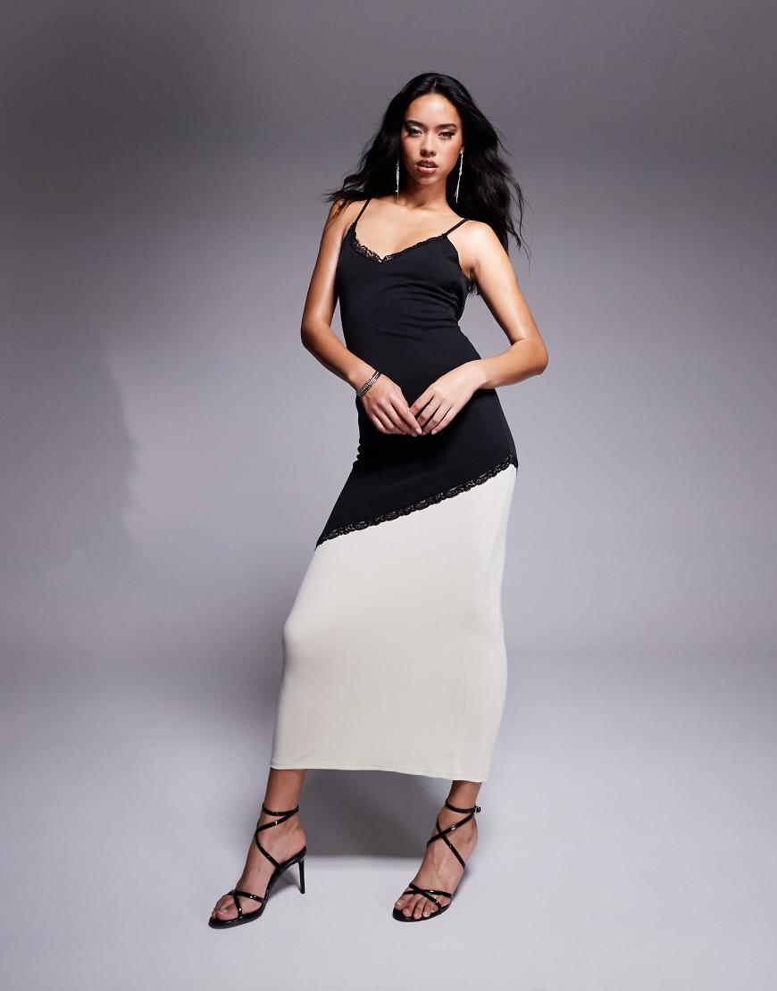 ASOS DESIGN - Maxi-Trägerkleid in Schwarzweiß mit Farbblöcken und Spitzenbesatz ASOS DESIGN - Maxi-Trägerkleid in Schwarzweiß mit Farbblöcken und Spitzenbesatz von ASOS DESIGN