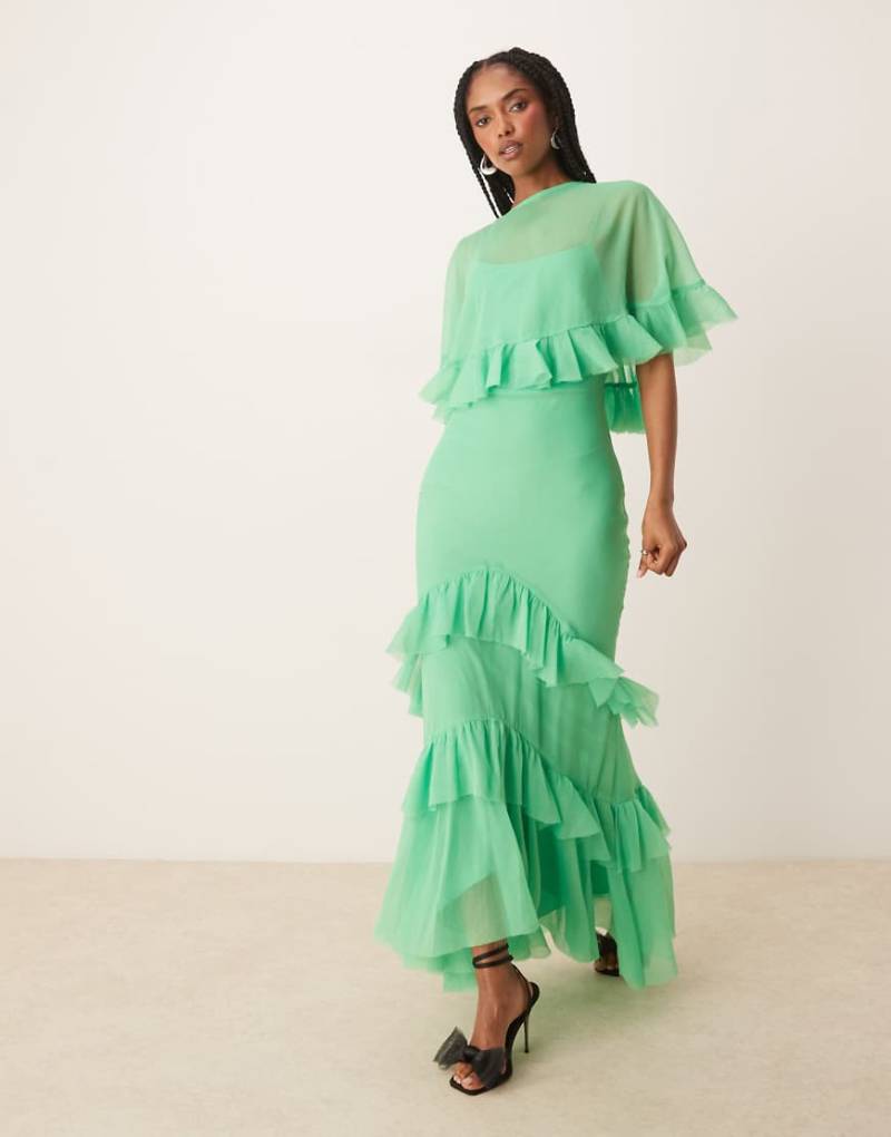 ASOS DESIGN - Maxikleid in leuchtendem Grün mit Cape-Overlay, Rüschen und Schrägschnitt von ASOS DESIGN