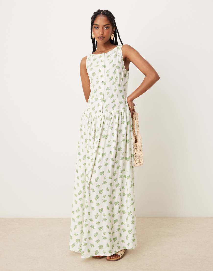 ASOS DESIGN - Maxikleid mit U-Boot-Ausschnitt, tief angesetzter Taille, Knopfleiste und grünem Blumenmuster-Bunt ASOS DESIGN - Maxikleid mit U-Boot-Ausschnitt, tief angesetzter Taille, Knopfleiste und grünem Blumenmuster-Bunt von ASOS DESIGN