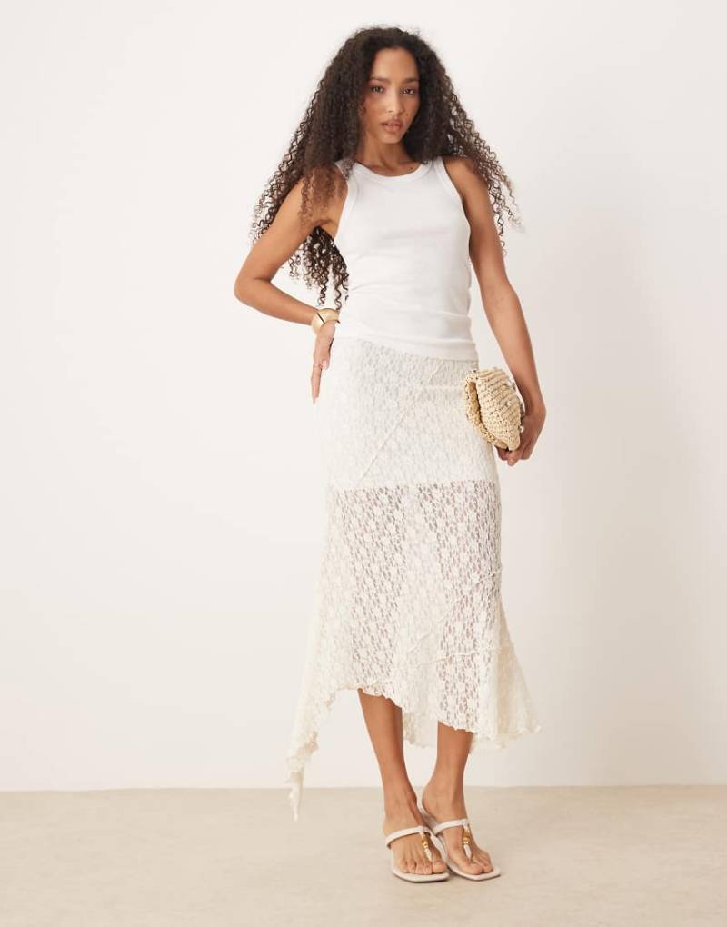 ASOS DESIGN - Maxirock aus transparenter, strukturierter Spitze in Elfenbeinweiß mit gespleißtem Design von ASOS DESIGN