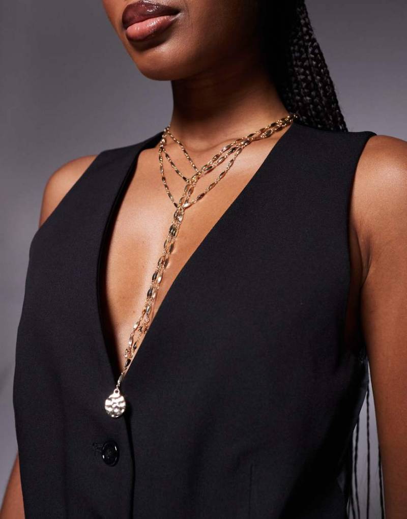 ASOS DESIGN - Mehrreihige Halskette in Goldoptik im Lasso-Stil mit Himmelskörper-Details-Goldfarben von ASOS DESIGN