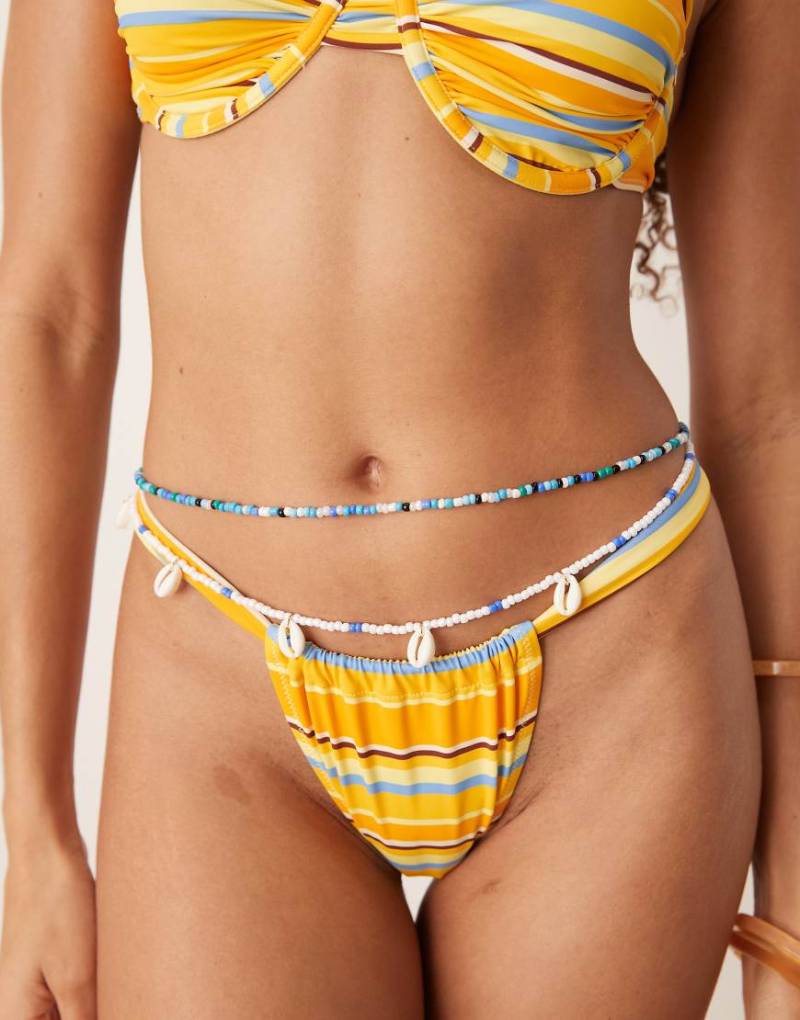 ASOS DESIGN - Mehrreihige Perlen-Bauchkette in Gold-Optik mit künstlichen Muscheln-Goldfarben von ASOS DESIGN