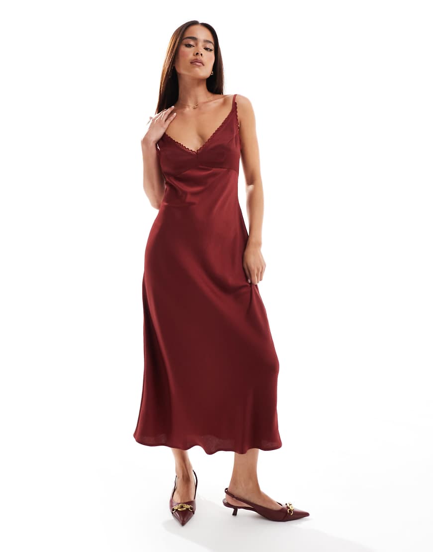 ASOS DESIGN - Midi-Schlupfkleid in gebranntem Rot mit Spitzenborte und schmalen Trägern ASOS DESIGN - Midi-Schlupfkleid in gebranntem Rot mit Spitzenborte und schmalen Trägern von ASOS DESIGN