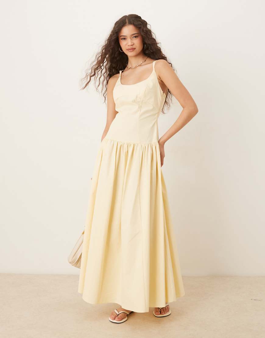 ASOS DESIGN - Premium - Midikleid in Buttermilchgelb mit schmalen Trägern, Ziernaht und tiefer Taille ASOS DESIGN - Premium - Midikleid in Buttermilchgelb mit schmalen Trägern, Ziernaht und tiefer Taille von ASOS DESIGN