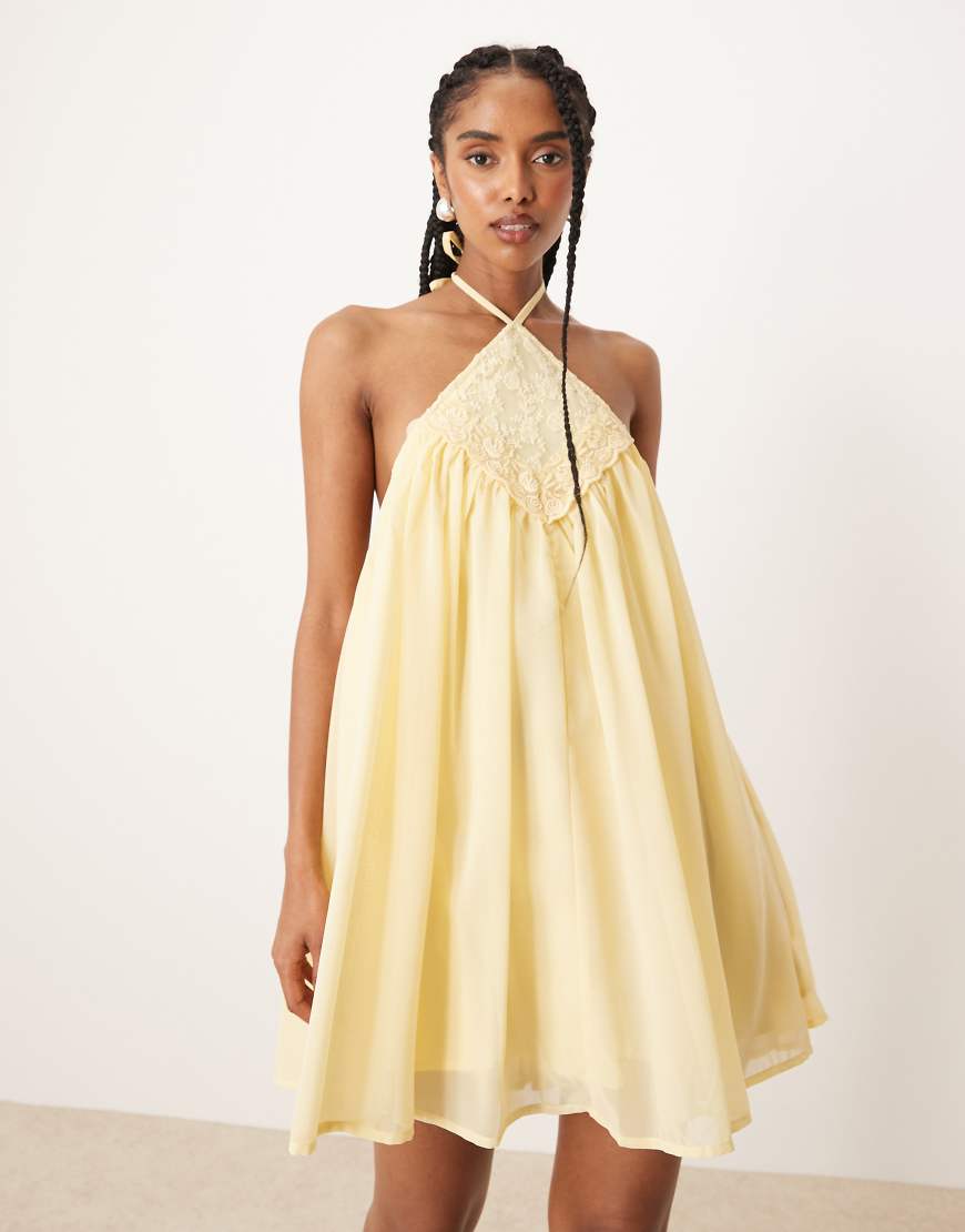 ASOS DESIGN - Mini-Ballonkleid in Zitrone mit Neckholder-Oberteil und Stickerei-Orange ASOS DESIGN - Mini-Ballonkleid in Zitrone mit Neckholder-Oberteil und Stickerei-Orange von ASOS DESIGN